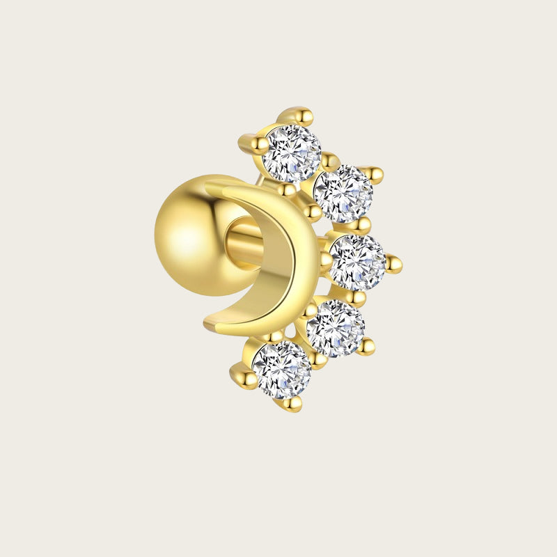 Ultra-petite 18K gold plated stud earrings on a model’s earlobe, showcasing minimalist shine.
