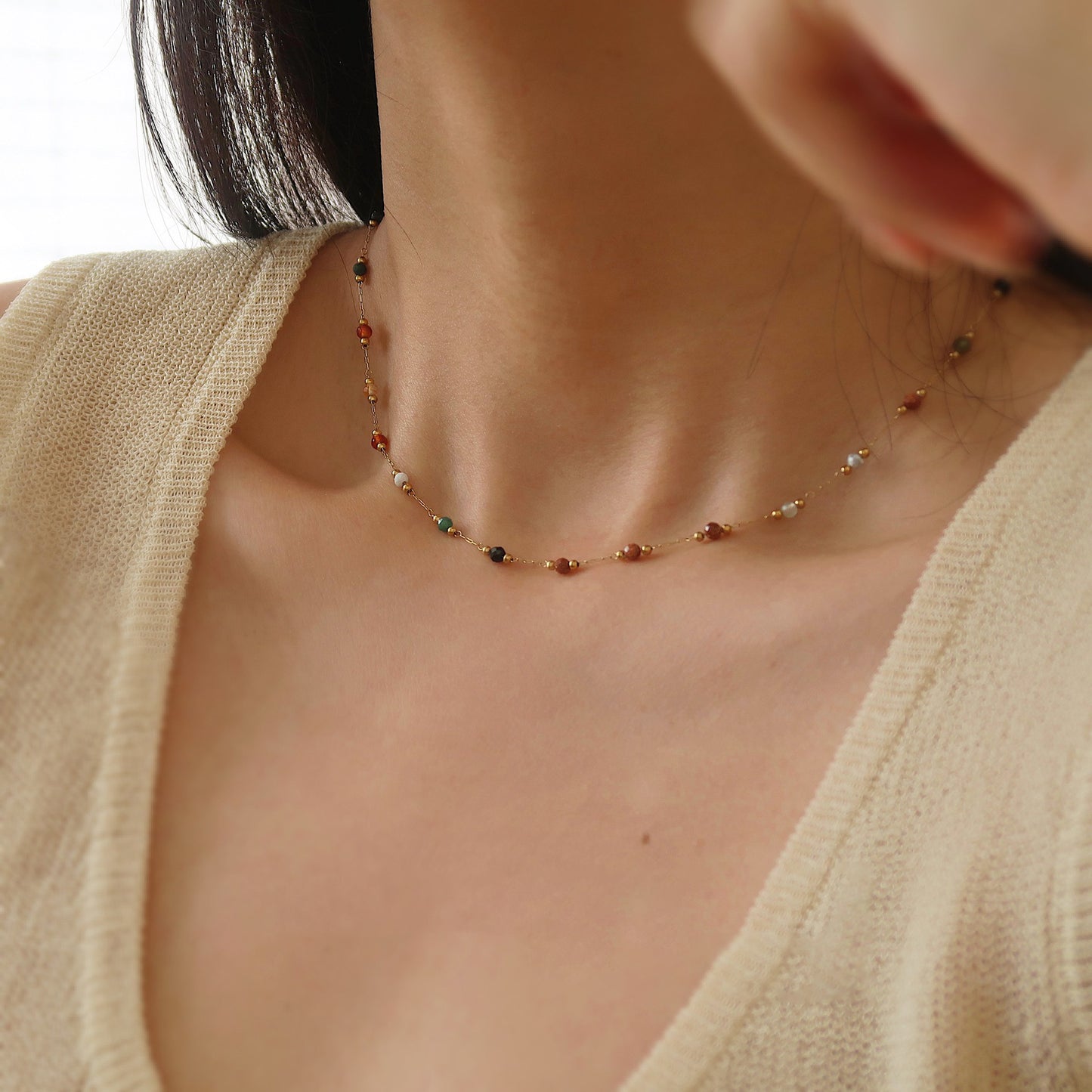 Colorful beaded necklace crystal details.