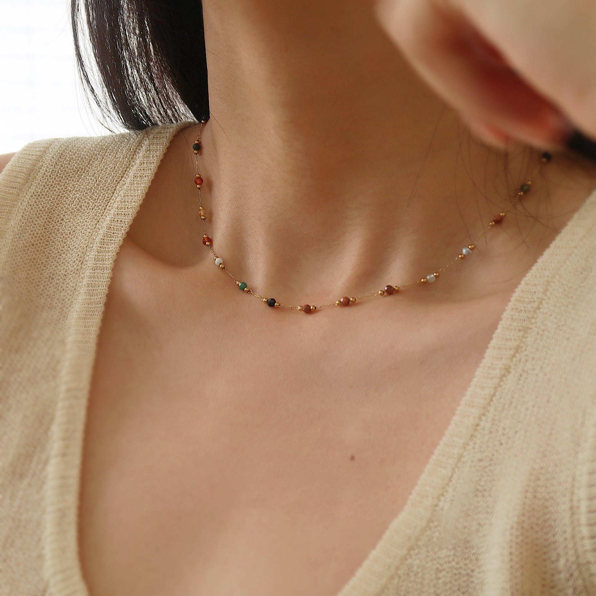 Colorful beaded necklace crystal details.