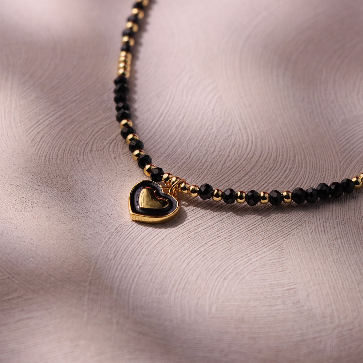 Chic heart pendant choker with black spinel beads