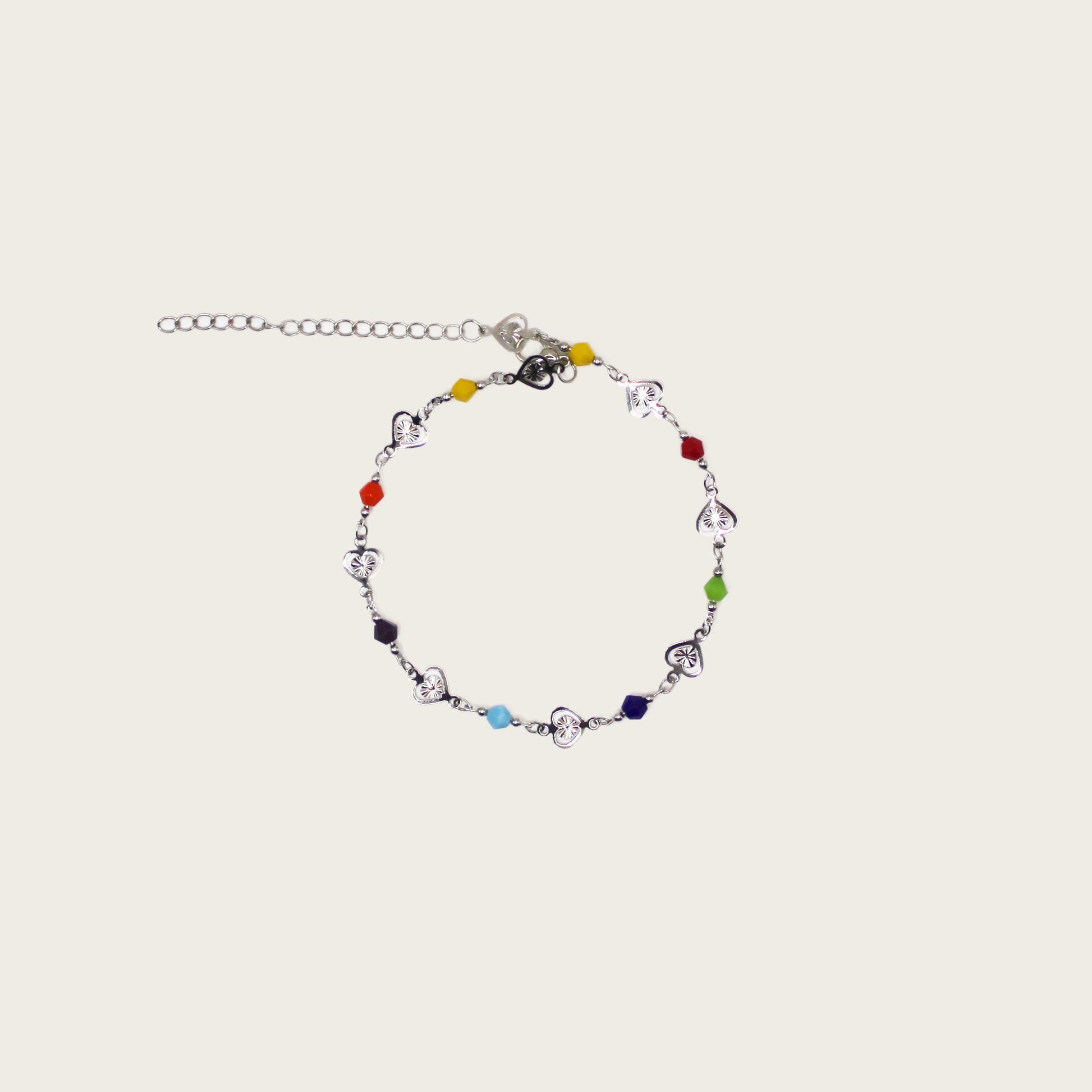 Bright candy-colored anklet with heart-shaped crystal beads on a delicate chain