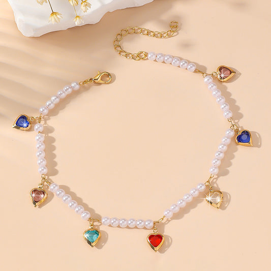 Colorful anklet with a heart-shaped crystal pendant