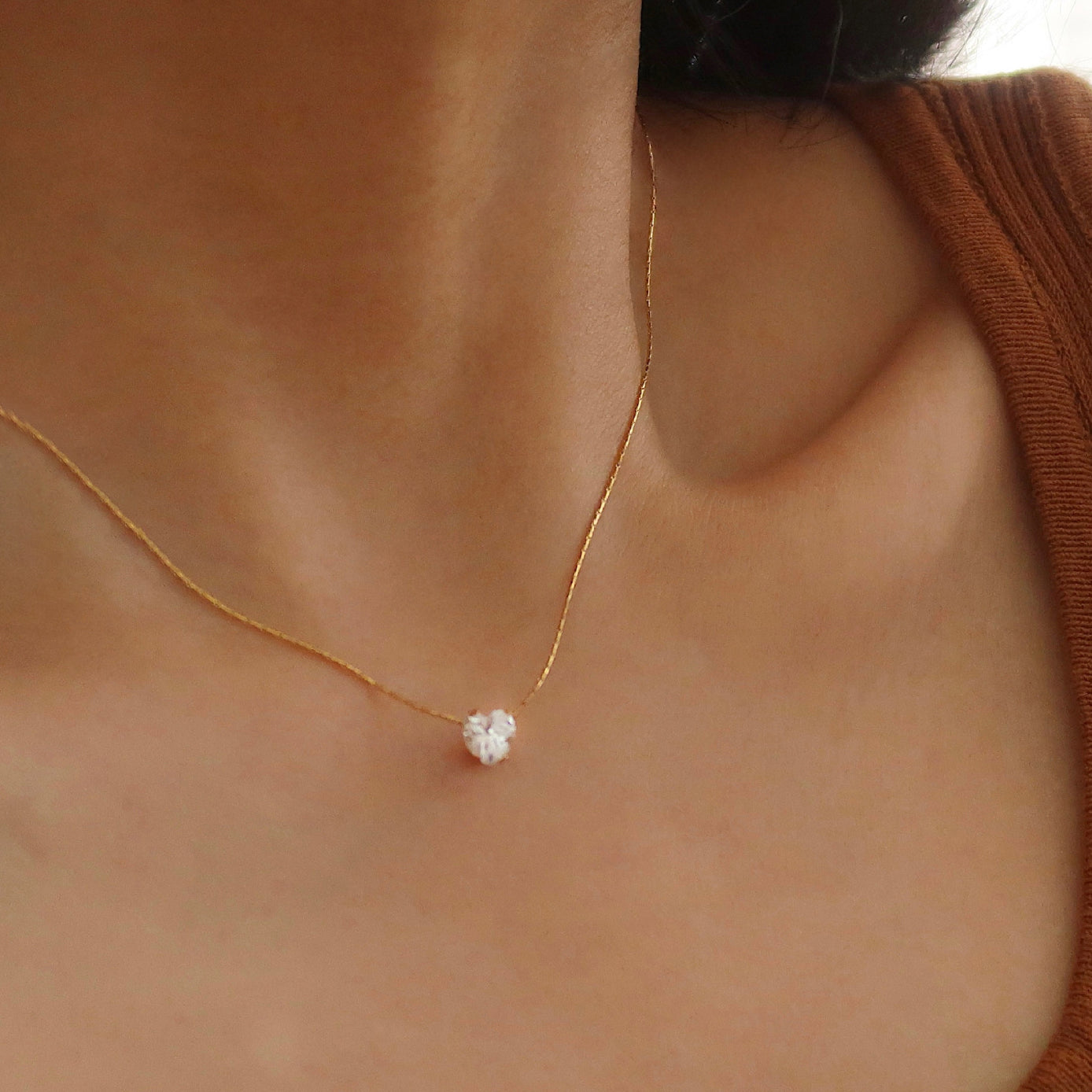 Delicate necklace featuring a crystal heart pendant