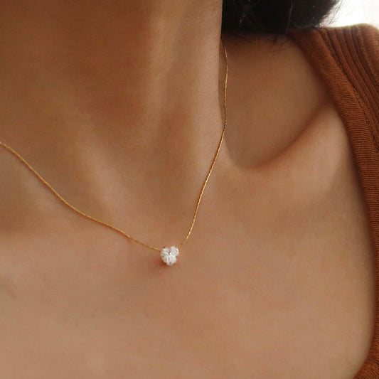 Delicate necklace featuring a crystal heart pendant