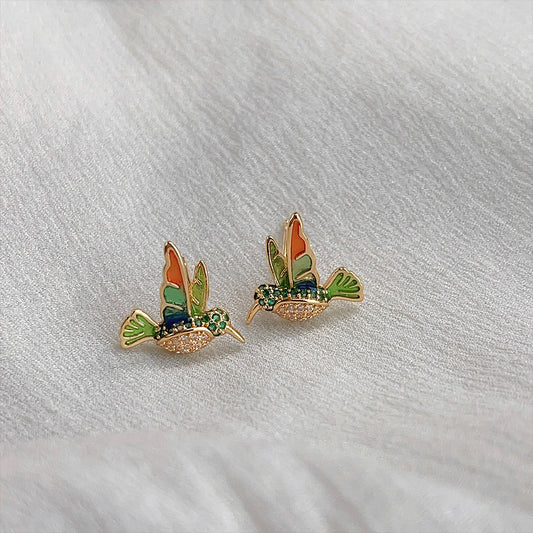 Delicate enamel hummingbird studs, bright and unique