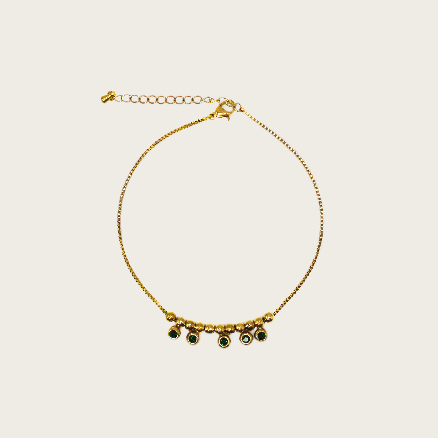 Charming anklet featuring green zircon accents