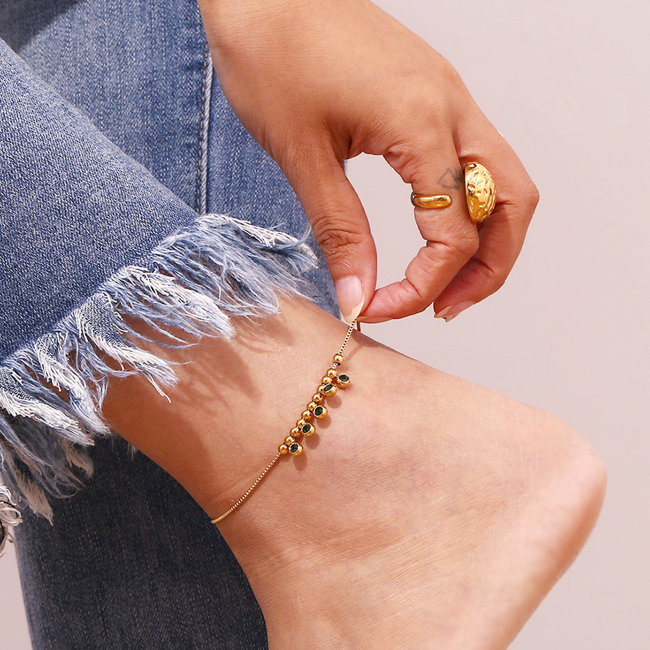 Stylish anklet with vibrant green zircon beads