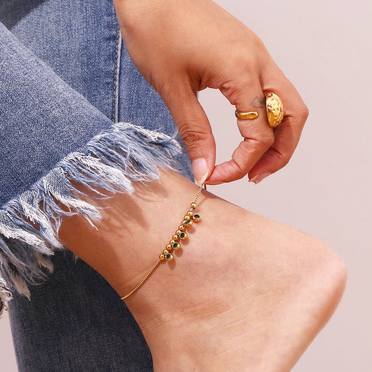 Stylish anklet with vibrant green zircon beads