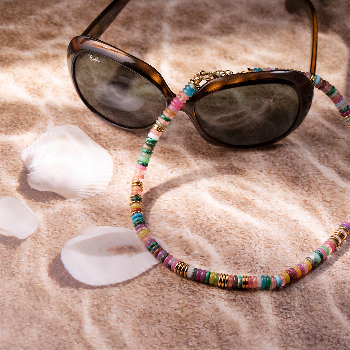 handmade piece featuring unique beads in a frisbee shape, perfect for a casual or boho-chic style