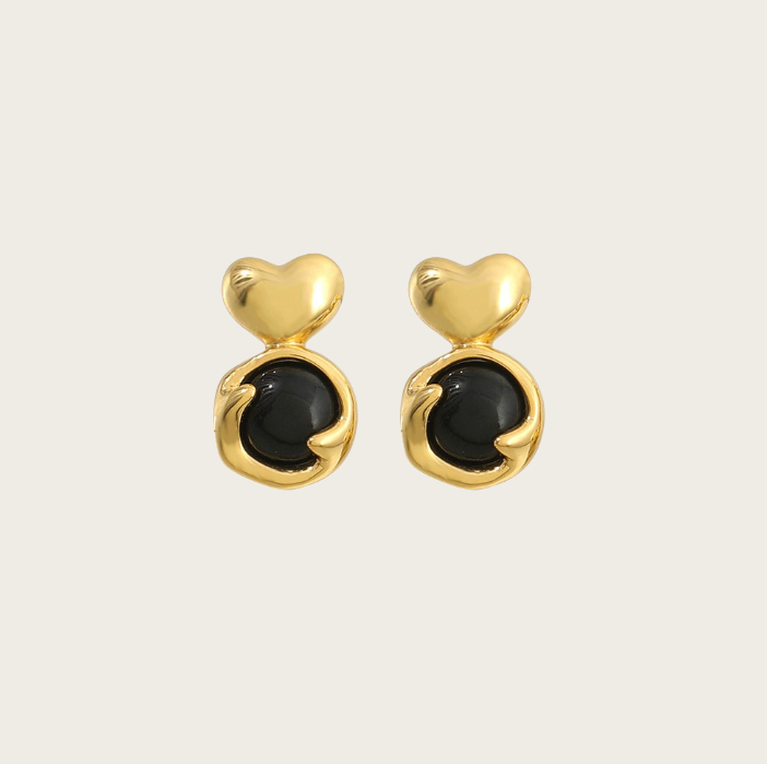 Charming heart-shaped stud earrings with natural stones.