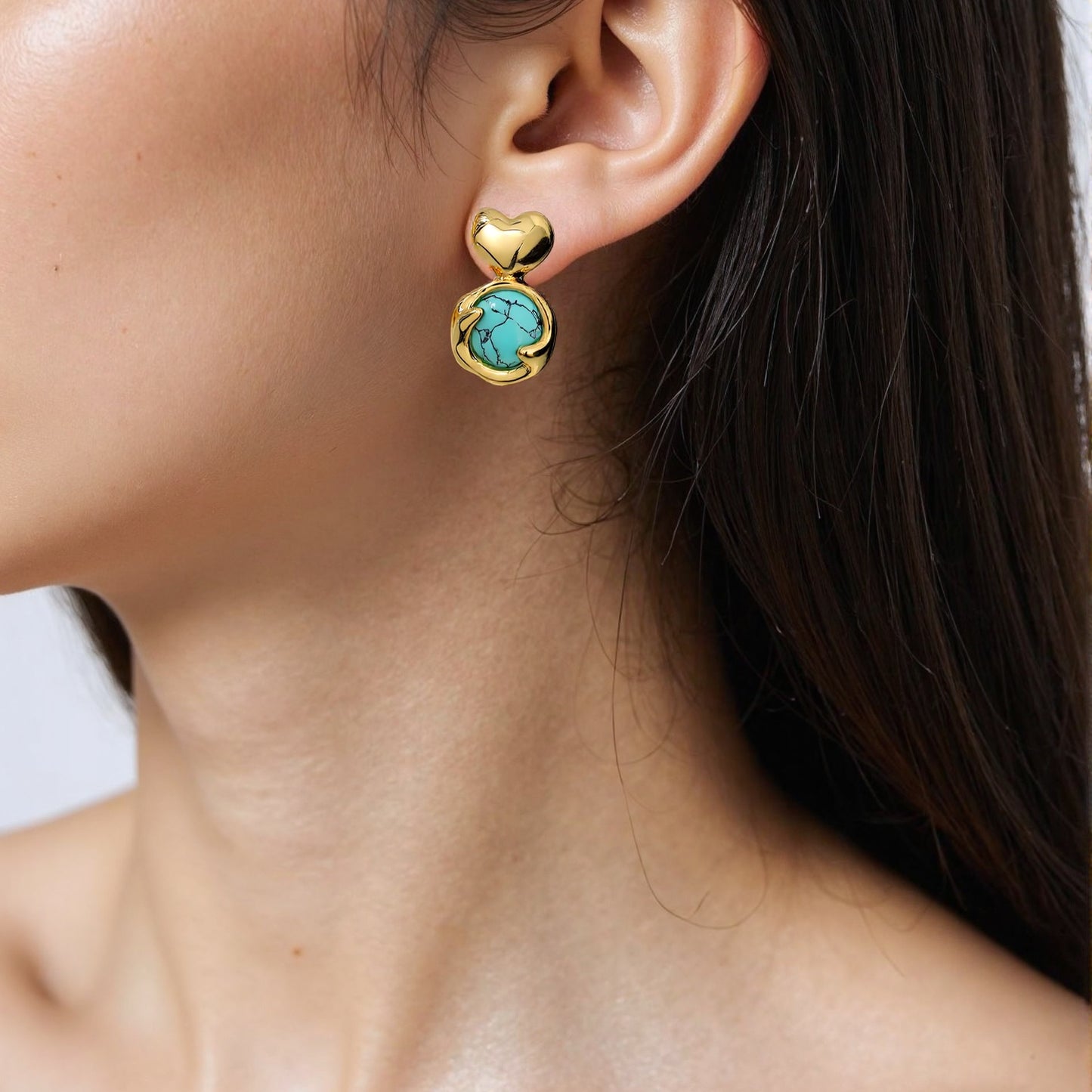 Romantic heart-shaped earrings featuring unique natural stones