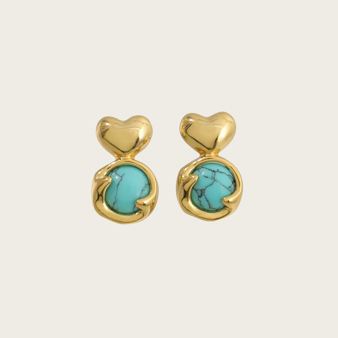 Charming heart-shaped stud earrings with natural stones.