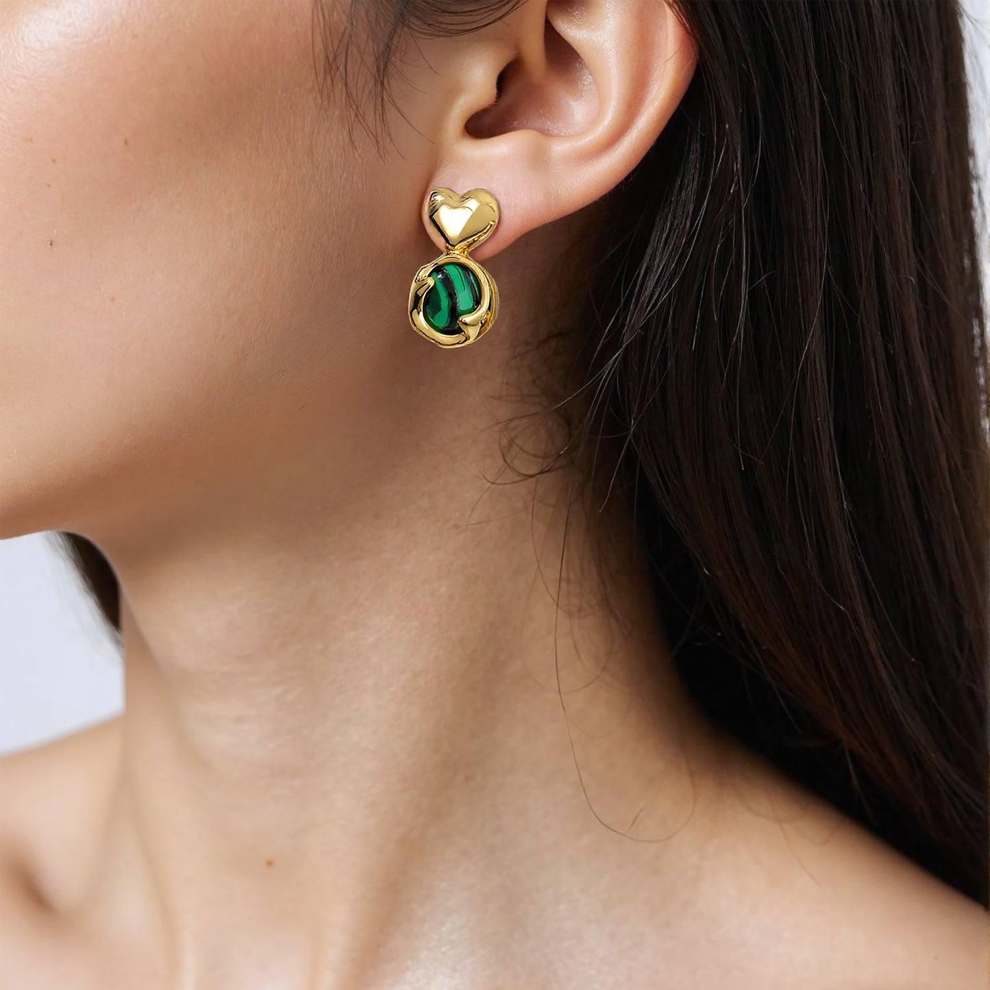 Romantic heart-shaped earrings featuring unique natural stones