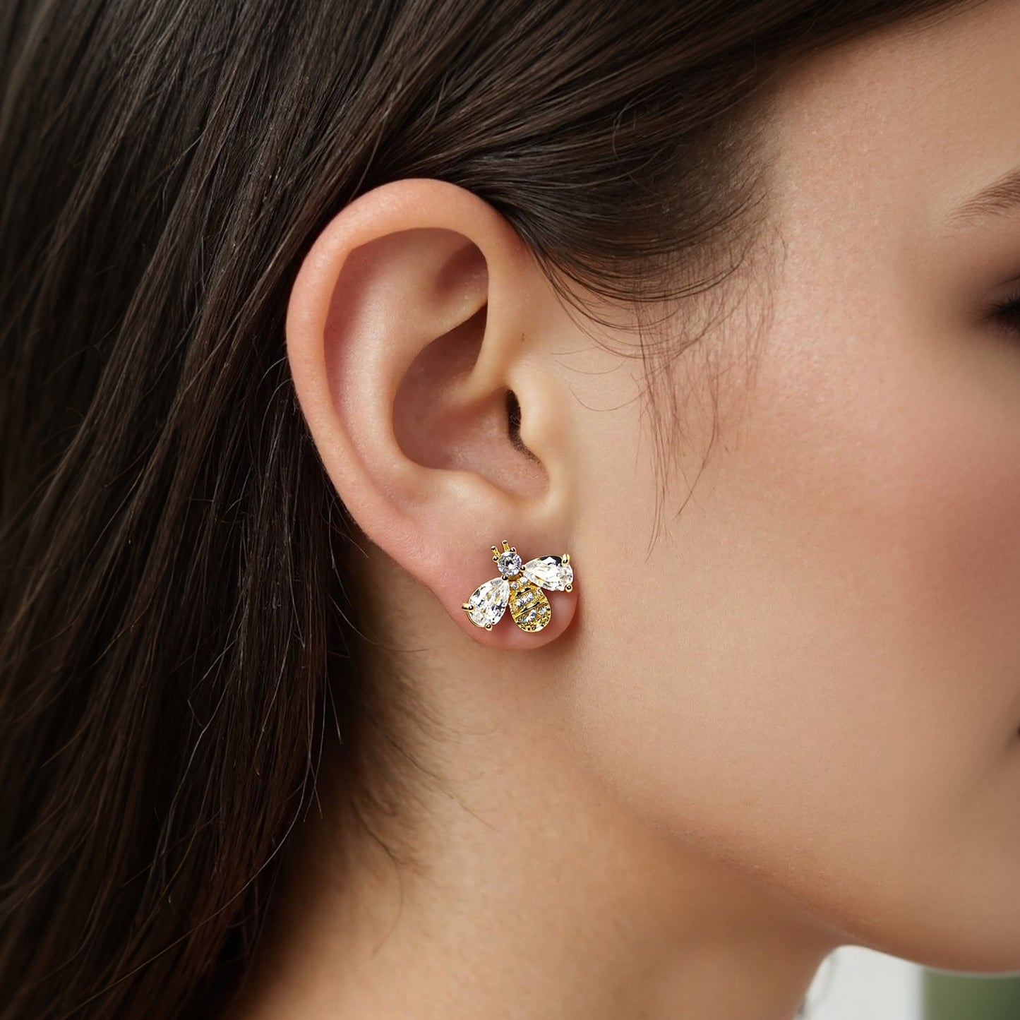 Delicate bee-shaped earrings with sparkling zircon