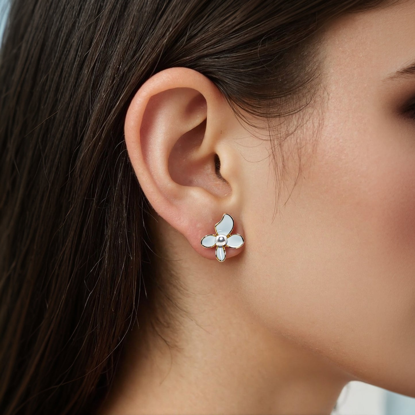 Elegant stub earrings with little white bloom design