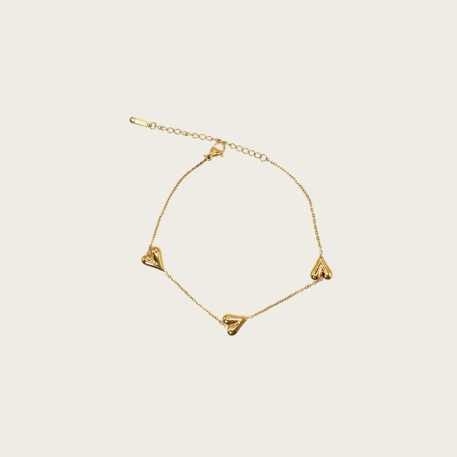 Delicate anklet with playful heart design