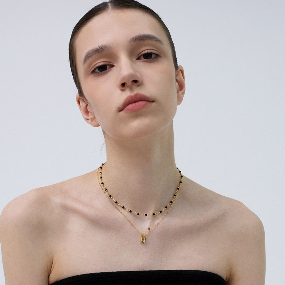 Timeless luxury necklace with a lucky lock design, layering necklace