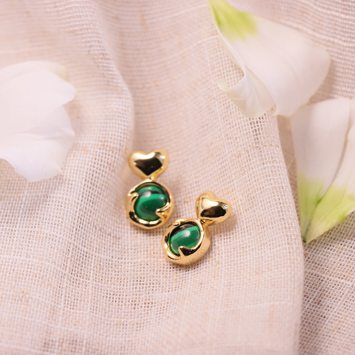 Romantic heart-shaped earrings featuring unique natural stones