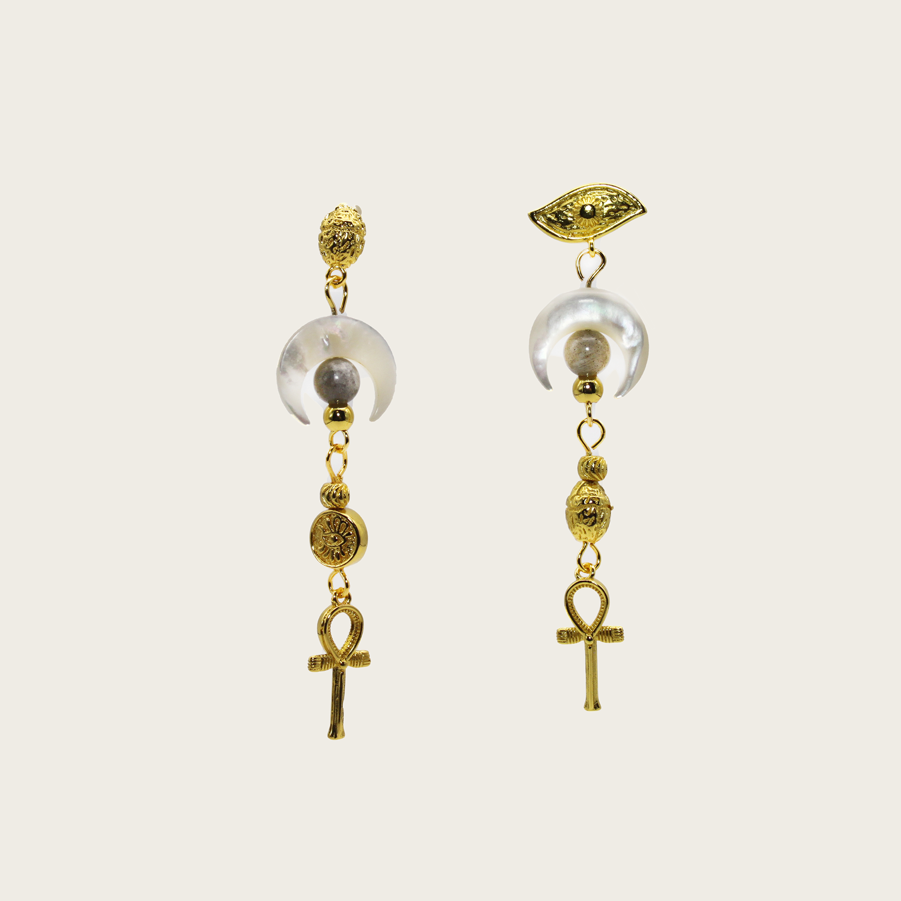Charming asymmetrical earrings with moon detail