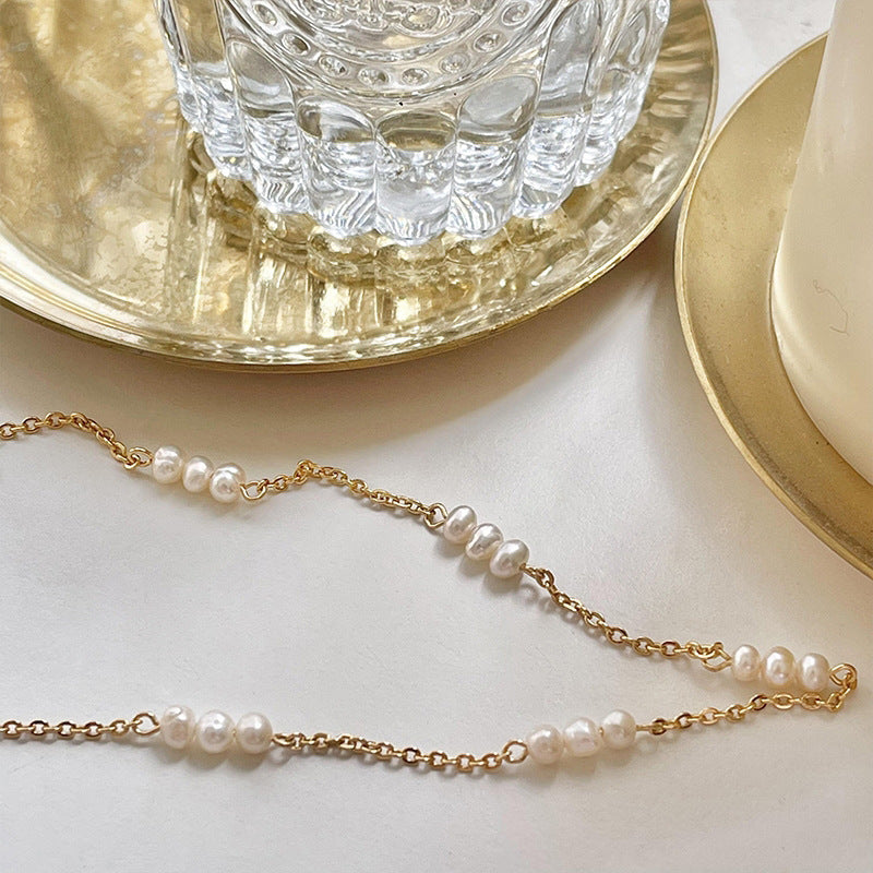 Charming segment necklace with natural pearls