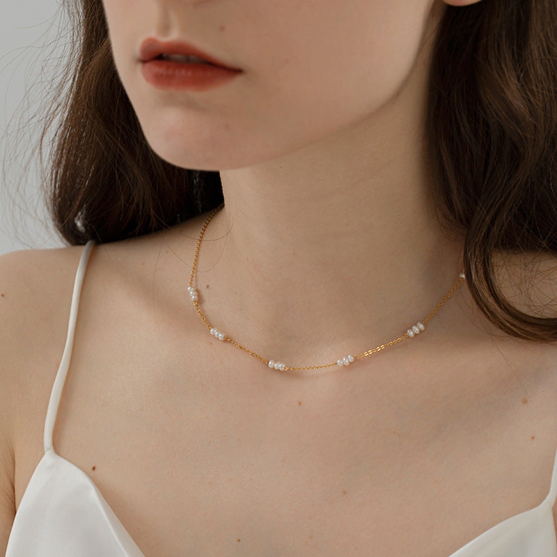 Timeless necklace featuring natural pearl segments