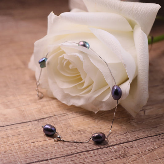 Chic peacock baroque pearl bracelet with distinctive iridescence