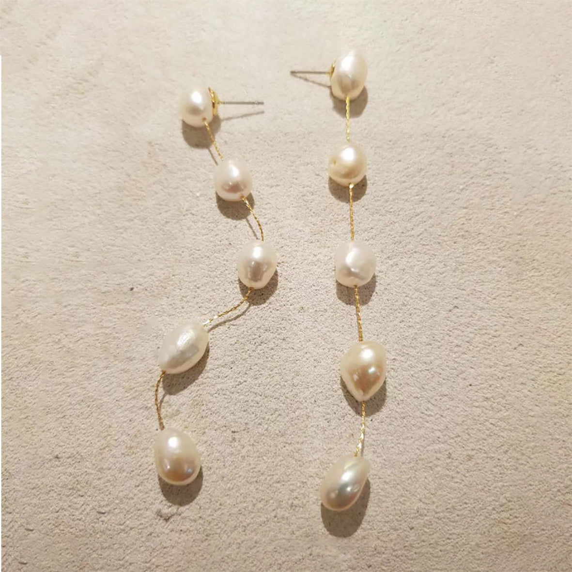 Elegant pearl and tassel earrings