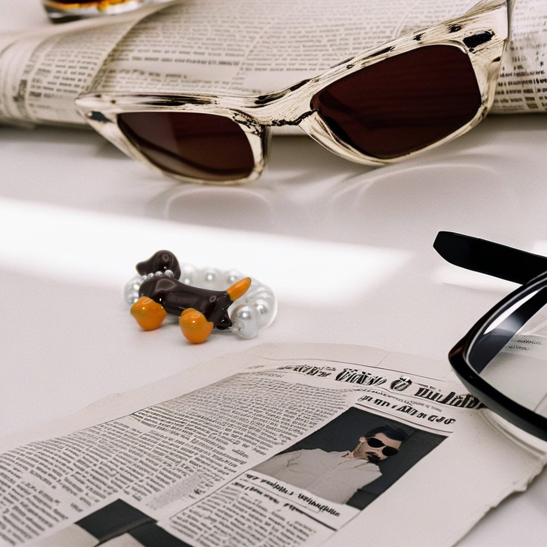 Playful puppy ring with a pearl accent