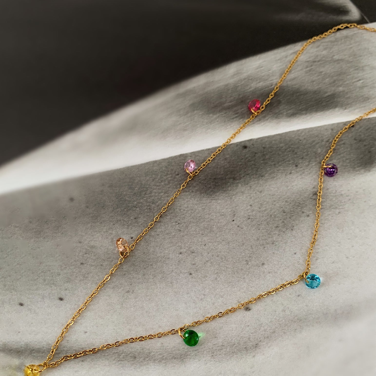 Elegant choker featuring rainbow-colored zirconia