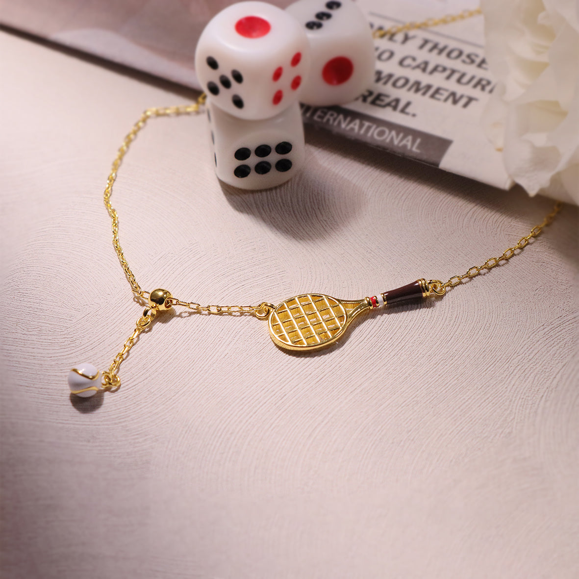 Elegant Tennis Racket Charm Necklace with a detailed tennis racket charm, ideal for gifting or personal style