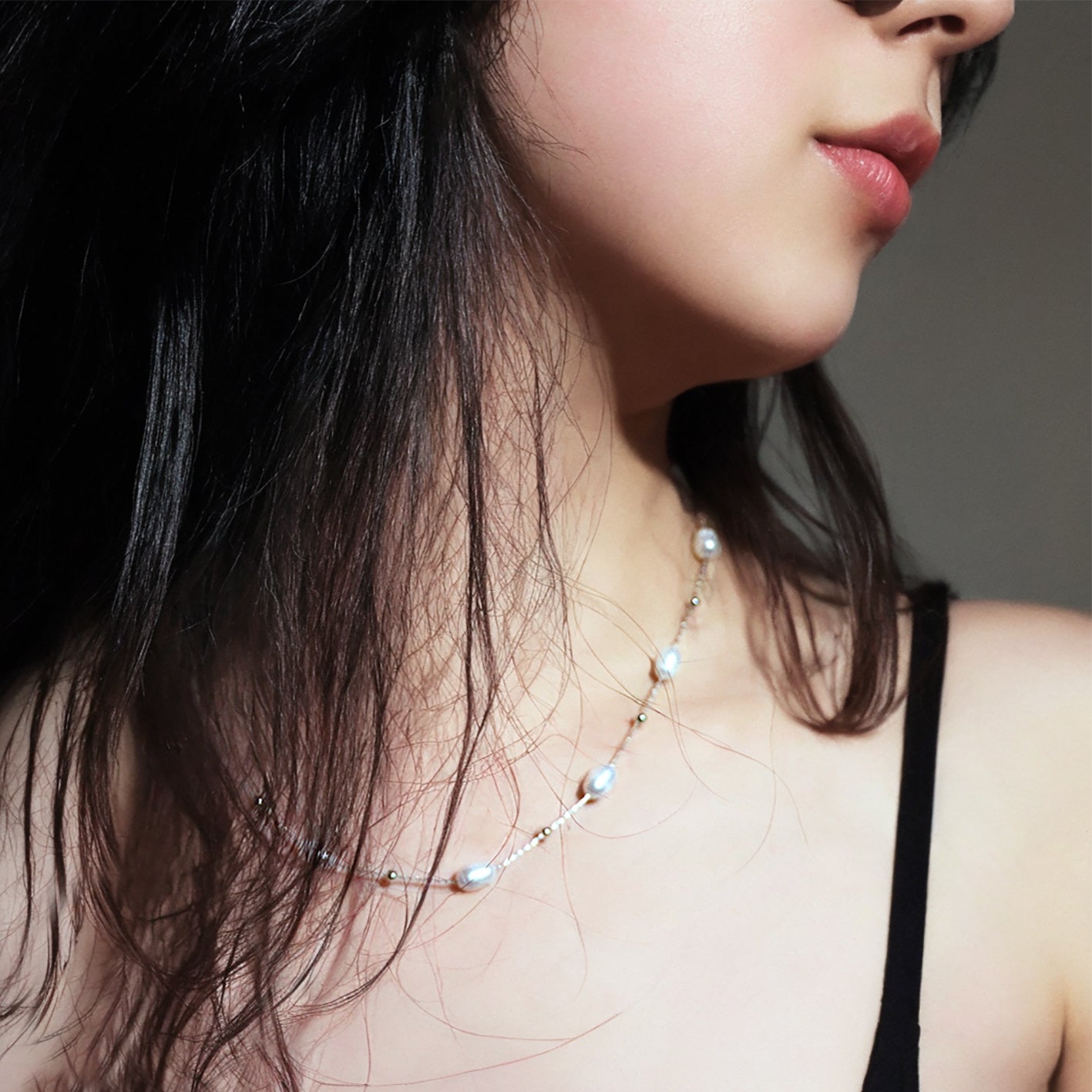 Elegant pearl necklace inspired by a starry night