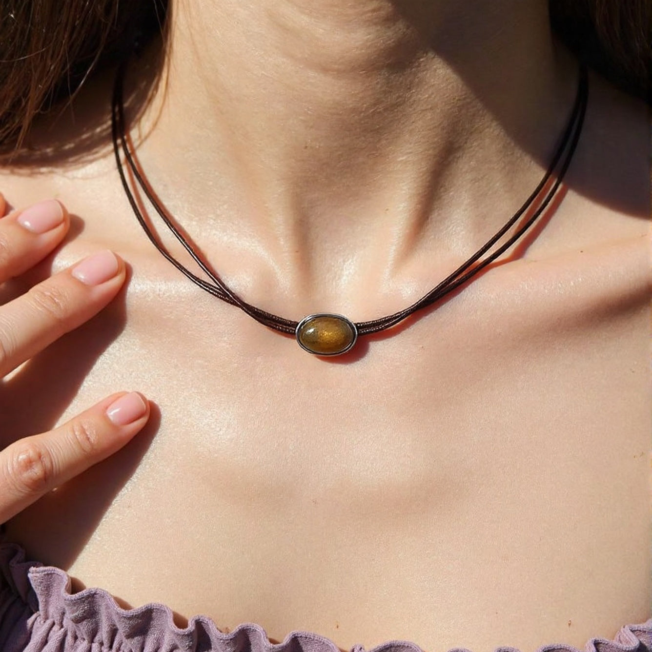 Elegant tigerite necklace with leather cord design