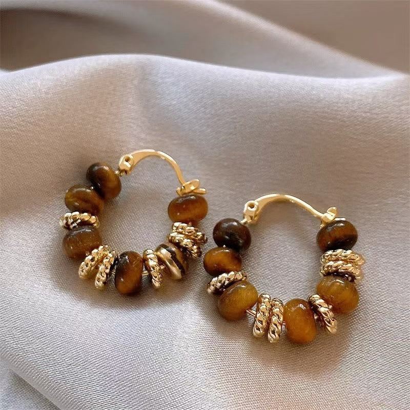 charming drop earrings with vibrant tigerite accents