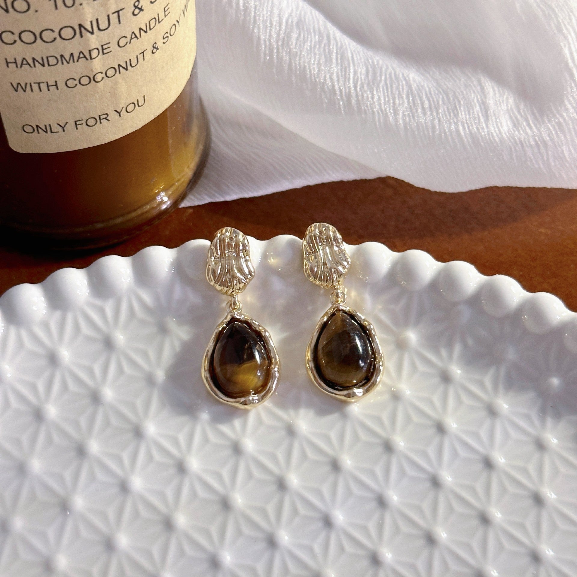 charming drop earrings with vibrant tigerite accents