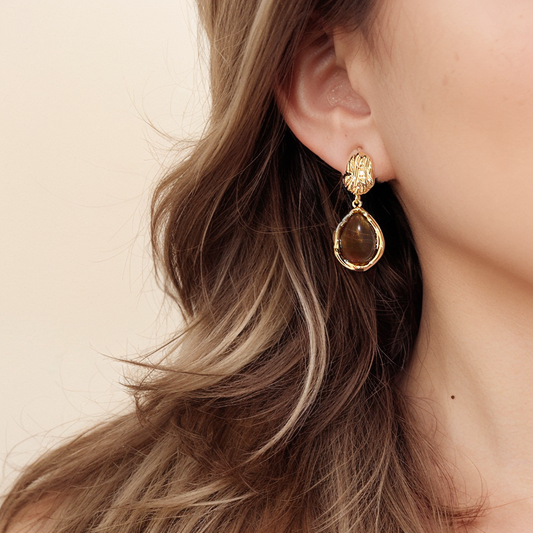 Elegant drop earrings featuring tigerite gemstones.